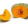 pumpkin sliced open on white background